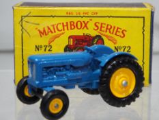 Matchbox - #72A Fordson Tractor with blue body, silver grill and the rarer yellow wheel hubs,