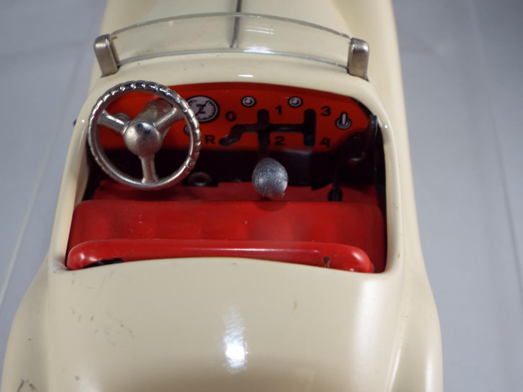 Schuco - #4001 Examico, cream tinplate clockwork unboxed car with four speed and reverse gears, - Image 4 of 4