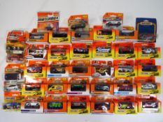 Matchbox - thirty eight diecast vehicle sin original window and blister packs includes #40 FJ