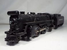 A Lionel train and tender featuring New York Central.