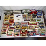 A collection of 48 diecast model busses, vans and trams including Dinky #297 Silver Jubilee Bus,