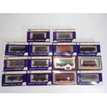 Model Railways - fourteen OO gauge wagons in original boxes by Dapol to include B706 16 ton Mineral