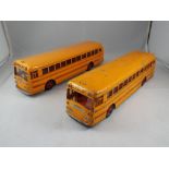 Dinky - two Dinky Super Toys Wayne School Buses, both playworn in fair to good condition,