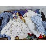 A large quantity of doll's dresses and clothes