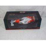 Minichamps - a 1:18 scale diecast F1 McLaren racing car bearing a signature (by repute that of