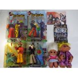 The Beatles and others - a good mixed lot to include four Beatles figures of Paul, John,