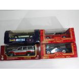 Diecast - four 1:18 scale diecast vehicles in original boxes by Revell,