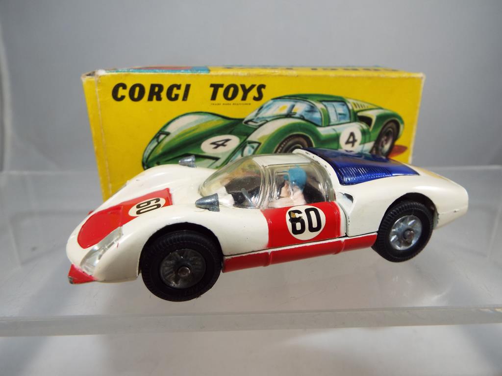 Corgi - #330 Porsch Carrera #6 in white with figure,