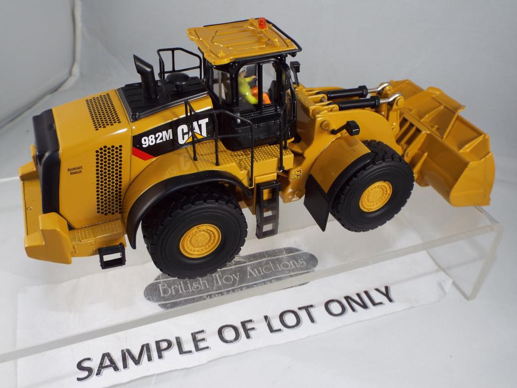 Diecast - three excavators in original boxes, comprising Diecast Masters CAT 982M Wheel Loader, - Image 3 of 3