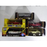 Diecast - five 1:18 scale diecast vehicles by Maisto,