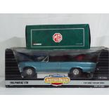 Diecast - two diecast vehicles in original boxes comprising ERTL 1964 Pontiac GTO in 1:12 scale and