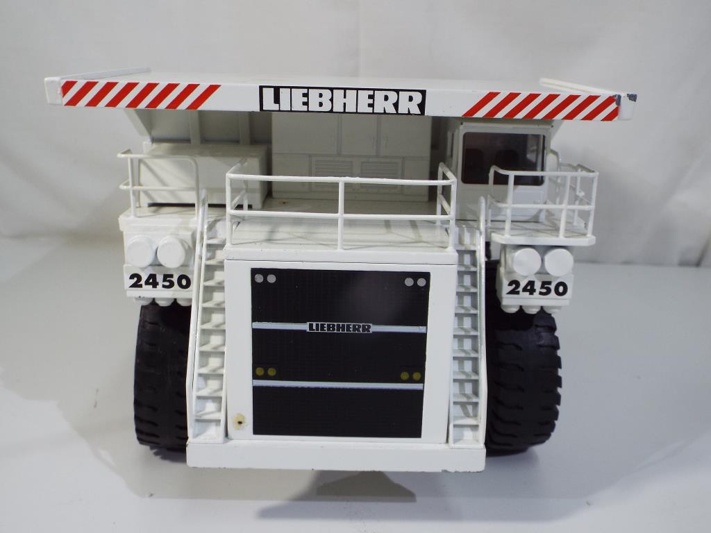 Diecast - a Conrad Mining Truck KL 2450 in original box in 1:50 scale, - Image 4 of 4