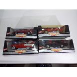 Diecast - four 1:18 scale diecast vehicles by ERTL to include 1971 Buick GSX,