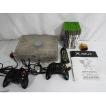 Gaming - XBOX - Microsoft Xbox Crystal Console, two controllers, remote and a quantity of games,