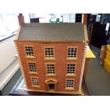 A doll's house, three storeys, six rooms plus stairways, and a quantity of furniture,