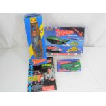 Thunderbirds - Pelham, Matchbox and others - three Thunderbirds related items and ephemera,