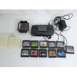 Gaming - Sega - a Sega Game Gear hand-held console with a quantity of games to include Price of