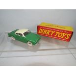 Dinky - a diecast model Volkswagen Karmann Ghia Coupe, green body with pale yellow roof,
