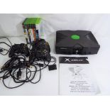 Gaming - X-Box - an X-Box games console with three controllers and a quantity of games to include