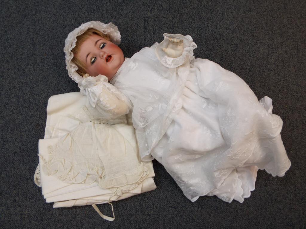 Schoenau & Hoffmeister - a bisque headed doll, sleeping blue eyes, open mouth, - Image 2 of 7