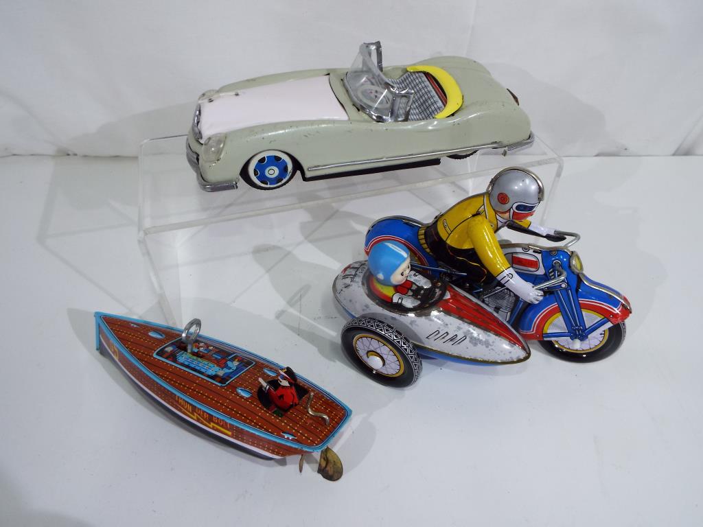 Three vintage tin-plate models comprising - Lucky Open Car friction drive toy car, reg no MF787, - Image 2 of 2
