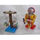 A tinplate Robot with clockwork mechanism with key and original box,