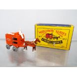 Matchbox by Lesney - a diecast model Horse drawn Milkfloat with driver figure # 7, orange, 4GMW,