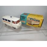 Corgi - a diecast model Commer Ambulance, off-white body with red interior and decals # 463,