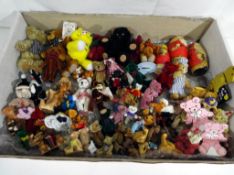 A collection of in excess of 50 quality miniature bears and soft toys,