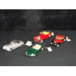Diecast - Franklin Mint - a collection of four unboxed 1:24 scale Franklin Mint models cars,