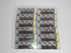 Model Railways - Minitrix - twelve boxed items of N car transporters by Trix/Minitrix,