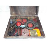 A vintage wooden box, containing early Meccano,