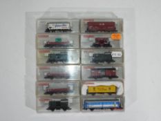 Model Railways - Fleishmann - a collection of twelve boxed items of N gauge rolling stock by