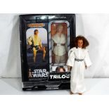 Star Wars by Kenner and Hasbro - an unboxed vintage large scale action figure of Princess Leia and