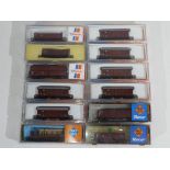 Model Railways - Roco - twelve boxed items of N gauge rolling stock by Roco,