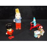 A good mixed lot of clockwork tinplate toys, includes clown, ice cream truck, rabbit and similar,