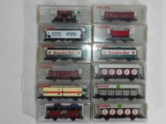 Model Railways - Fleischmann - twelve boxed items of N gauge rolling stock by Fleichmann,