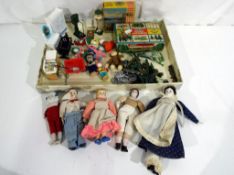A good mixed lot of vintage doll's house accessories and toys to include a Tri-ang Spot-On