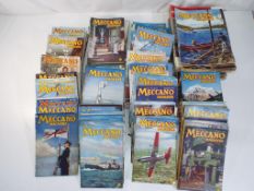 Meccano - in excess of 100 Meccano magazines from 1942 - 1969 [some full sets] in playworn