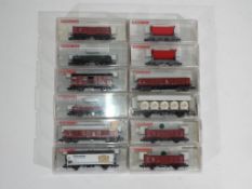 Model Railways - Fleischmann - twelve boxed items of N gauge rolling stock by Fleichmann,