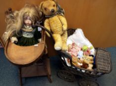 A wooden metamorphic doll's high-chair with a ceramic faced doll entitled 'Lily Sitting' by the