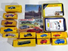 Diecast - eleven Atlas Edition diecast vehicles with two catalogues and two tins,