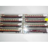 Fleischmann N gauge - eight passenger carriages, maroon and cream livery,