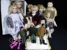 Ten dolls and three action figures to include two Action Man figures from 1964 and a selection of