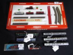 Model Railways - a Fleischmann set reference 9370 and five additional coaches with 0-10-0 steam