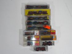 Model Railways - Roco, Fleichmann, Minitrix - twelve boxed items of N gauge rolling stock by Roco,