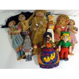 A good collection of nine cloth dolls to include a Sergeant at Arms soldier doll,