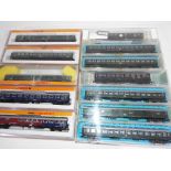 Arnold, Atlas and Roco N gauge - twelve passenger carriages, maroon and cream livery,