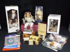 Dolls - four dolls in original boxes,