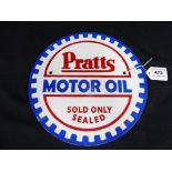 A circular cast iron advertising wall plaque marked Pratts Motor Oil, 24 cm (d.